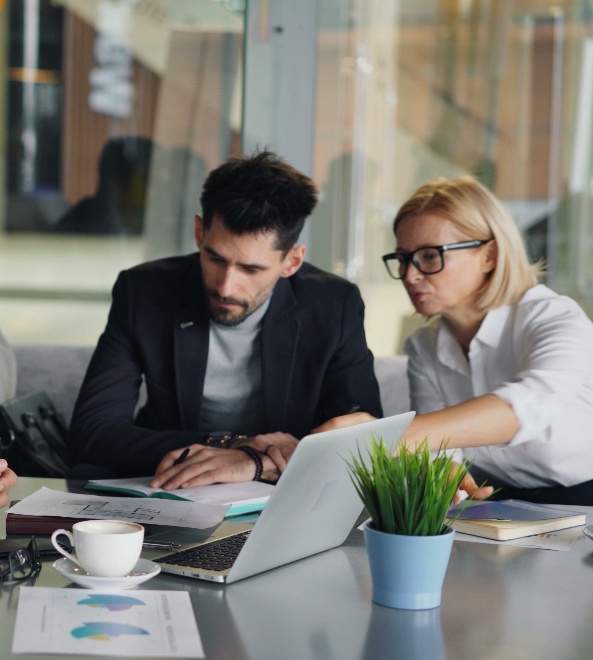 Business leaders reviewing commercial risk assessment