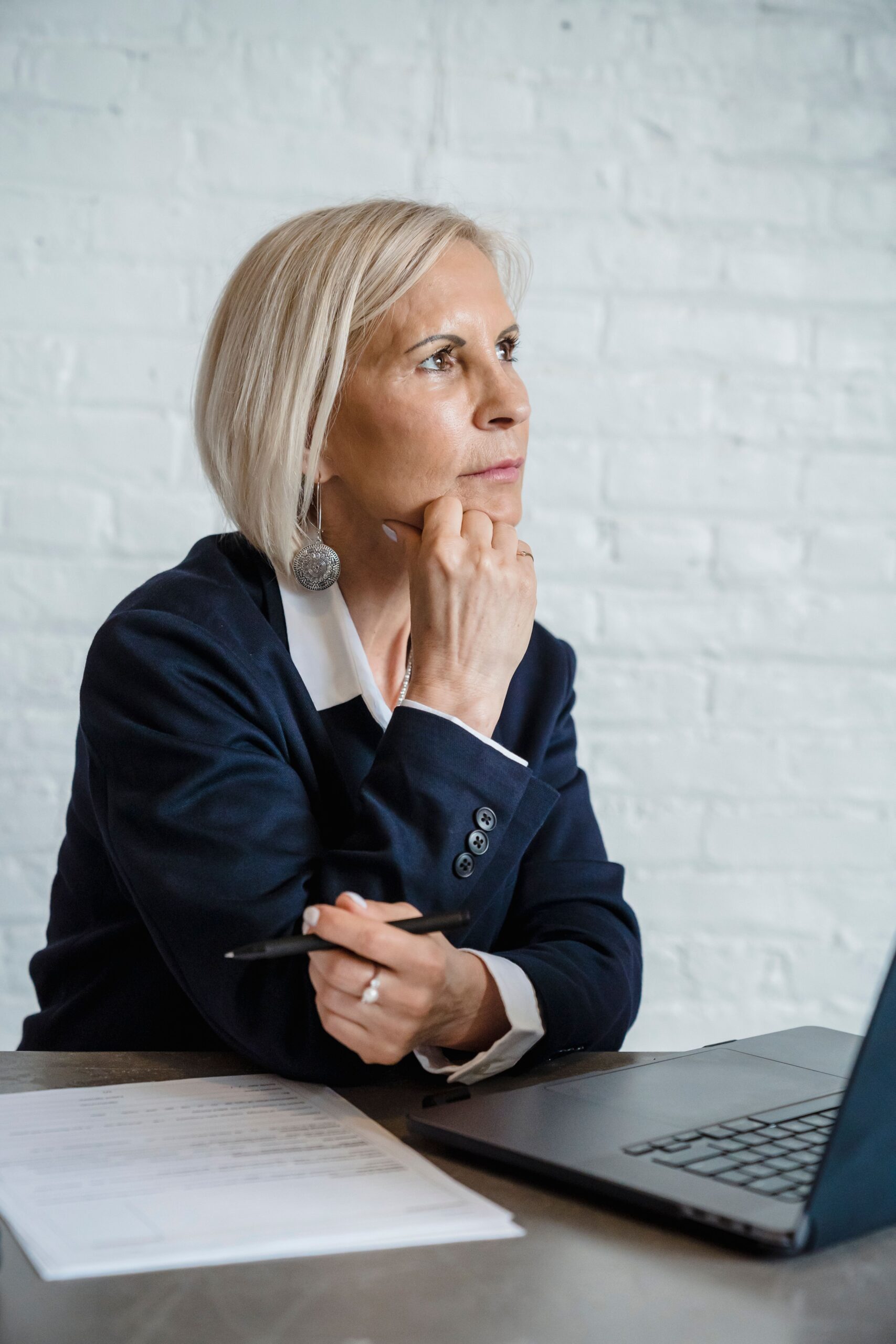 Female executive reviewing potential business risk and documentation concerns